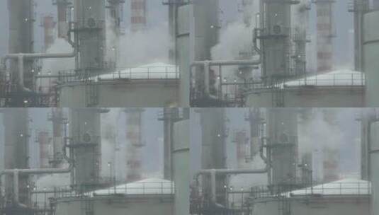 一家炼油厂的空气排放物。烟和污染来自烟囱高清在线视频素材下载