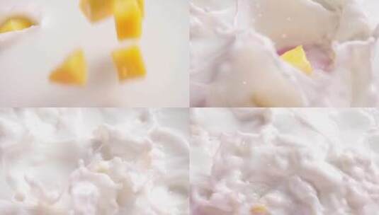 芒果粒落入牛奶慢镜头高清在线视频素材下载