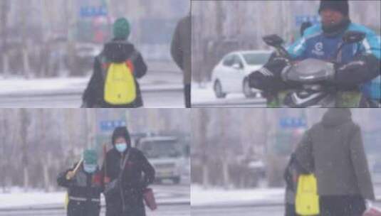 大雪天飘雪花妈妈带着孩子过马路走斑马线高清在线视频素材下载