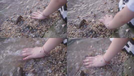 童趣海边玩沙扔石子高清在线视频素材下载