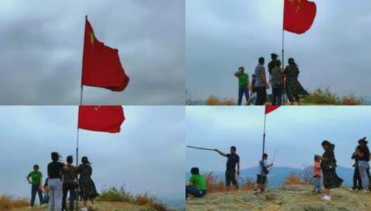 一群人在山顶护旗高清在线视频素材下载