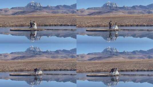 高原枯黄草原湖泊雪山拍写真婚纱高清在线视频素材下载