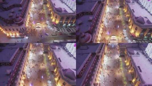 哈尔滨中央大街夜晚雪景航拍高清在线视频素材下载