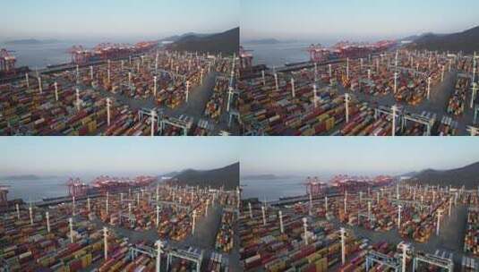 夕阳下航拍宁波北仑集装箱码货轮装卸高清在线视频素材下载