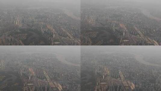 迷雾中飞机窗外的重庆市现代城市建设风光高清在线视频素材下载