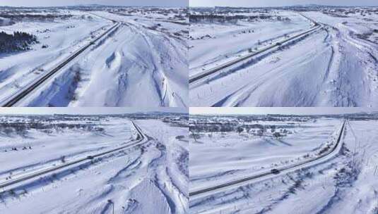 被白雪覆盖的广袤原野及蜿蜒道路高清在线视频素材下载