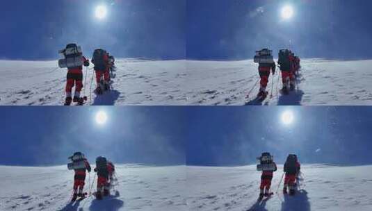 风雪中攀登慕士塔格雪山的登山者高清在线视频素材下载