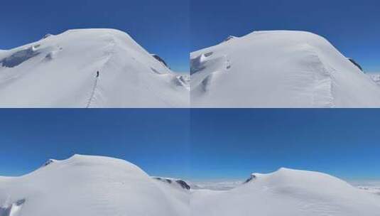 航拍四川第二高峰中山峰雪山云海的攀登者高清在线视频素材下载