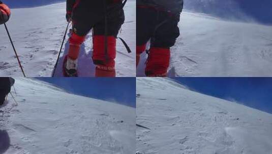 风雪中攀登慕士塔格雪山的登山者高清在线视频素材下载