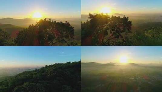 航拍广州白云山日出时分城市与山峦景色高清在线视频素材下载