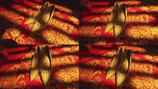 中式婚鞋置于中式花纹红布上高清在线视频素材下载