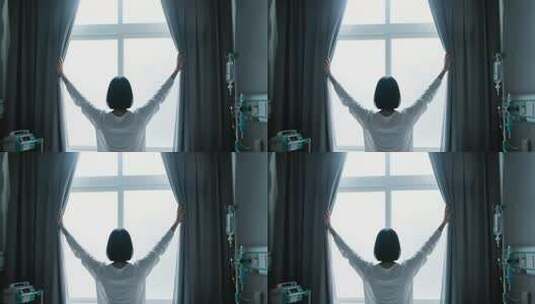 病房内女人拉开窗帘高清在线视频素材下载