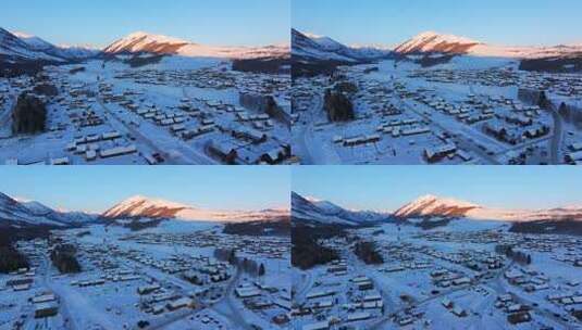 新疆阿勒泰地区禾木村雪景航拍高清在线视频素材下载