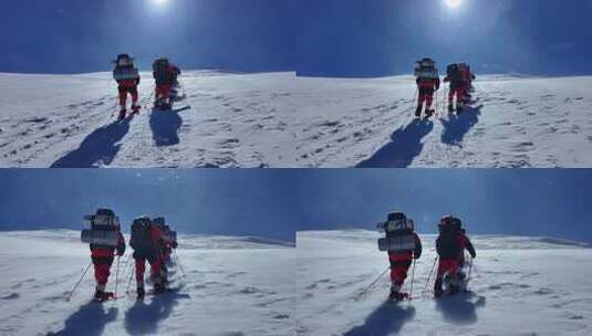 风雪中攀登慕士塔格雪山的登山者高清在线视频素材下载