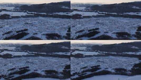 新疆阿勒泰地区禾木村雪景航拍高清在线视频素材下载