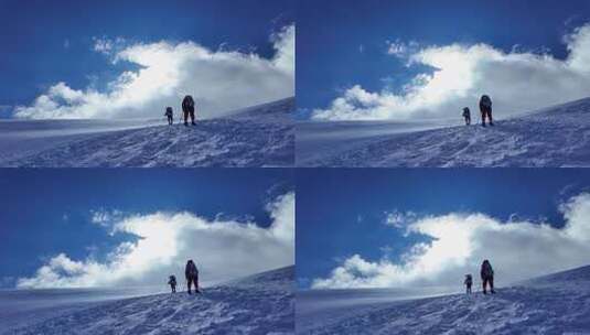 风雪中攀登慕士塔格雪山的登山者高清在线视频素材下载