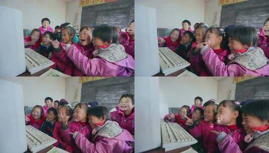 贫困地区的小学生在破旧的教室上课孩子们在教室里使用电脑高清在线视频素材下载