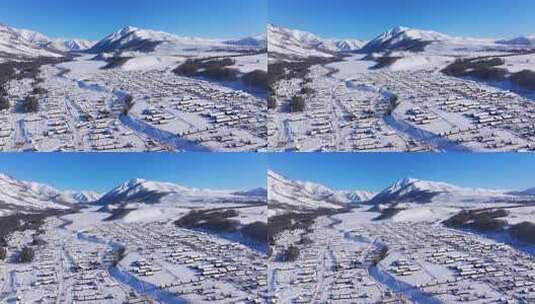 新疆阿勒泰地区禾木村雪景航拍高清在线视频素材下载