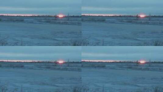 太阳从冻土带的结冰公路后升起高清在线视频素材下载