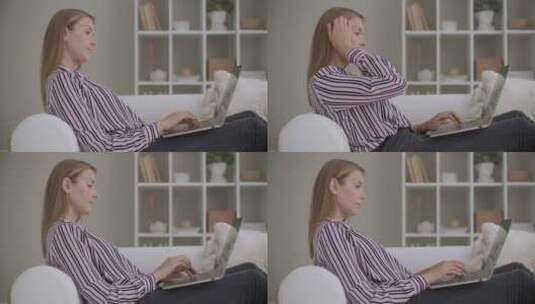 女人在沙发上处理工作高清在线视频素材下载