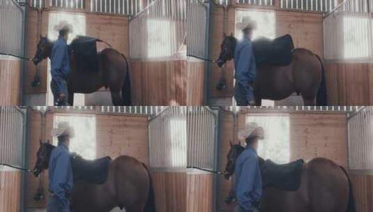 牛仔将马鞍放在马背上高清在线视频素材下载