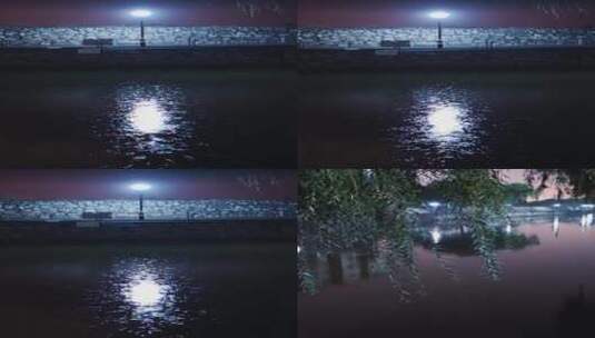 雨夜路灯在河中的倒影高清在线视频素材下载