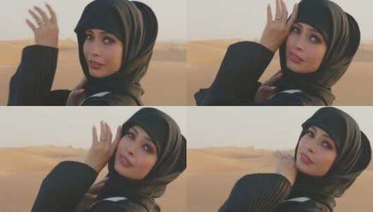 站在沙漠里戴着头巾的女人摆拍高清在线视频素材下载