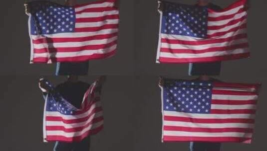 手拿美国国旗的人高清在线视频素材下载