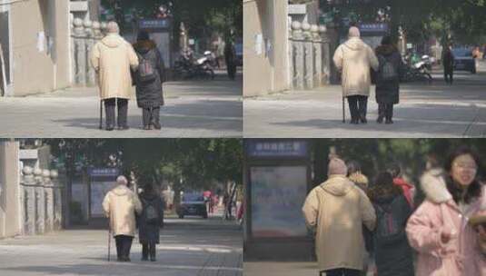 人间烟火街道上老人互相掺扶相伴而行高清在线视频素材下载