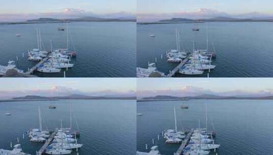 多米尼加共和国巴伊亚德拉斯卡尔德拉斯港停泊船只的航拍高清在线视频素材下载