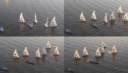 湖面上的的小艇帆船和摩托艇高清在线视频素材下载