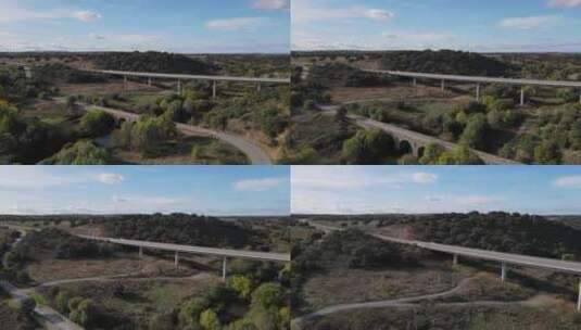 葡萄牙维拉福尔莫萨，背景是老罗马桥和现代高架道路上的空中前进高清在线视频素材下载