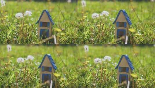 草地玩具屋代表生态家园场景高清在线视频素材下载
