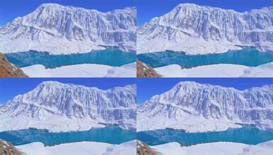 4K航拍唯美雪山湖泊冬季新疆美景高清在线视频素材下载