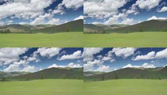 蓝天白云和美丽的绿色草原高清在线视频素材下载