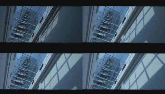 CBD商业区大楼窗户光影延时高清在线视频素材下载