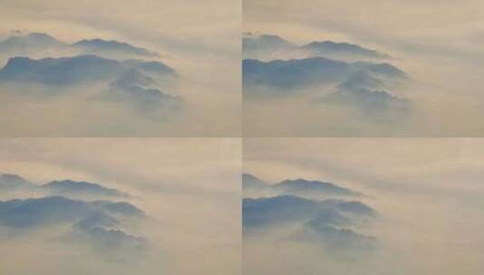 安徽安庆飞机窗外云雾缭绕的桃墅岭山脉高清在线视频素材下载