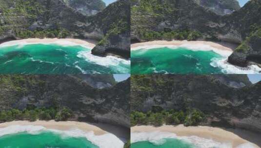 印尼努沙佩尼达岛精灵坠崖沙滩和绿松石大海高清在线视频素材下载