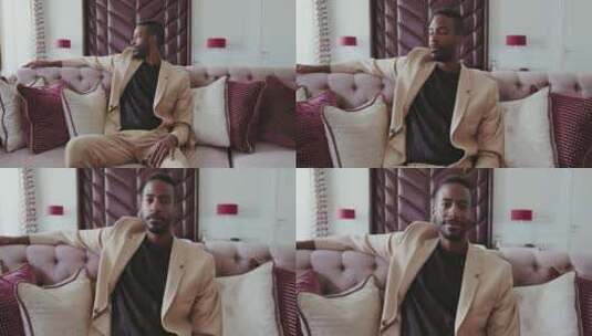 坐在沙发上的男人高清在线视频素材下载