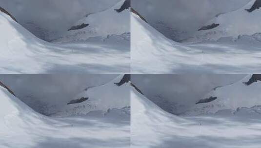 航拍四川第二高峰中山峰雪山云海的攀登者高清在线视频素材下载