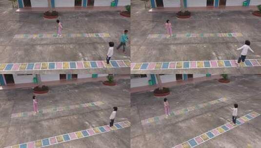 儿童在户外场地玩跳房子游戏高清在线视频素材下载