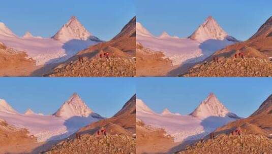 雪山下的登山者徒步场景高清在线视频素材下载