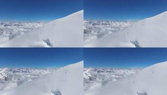 航拍四川第二高峰中山峰雪山云海的攀登者高清在线视频素材下载