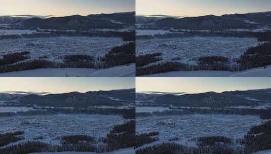新疆阿勒泰地区禾木村雪景航拍高清在线视频素材下载