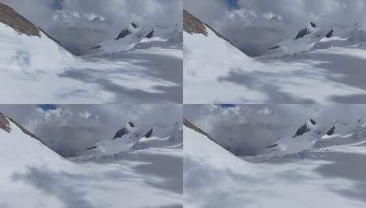 航拍四川第二高峰中山峰雪山云海的攀登者高清在线视频素材下载