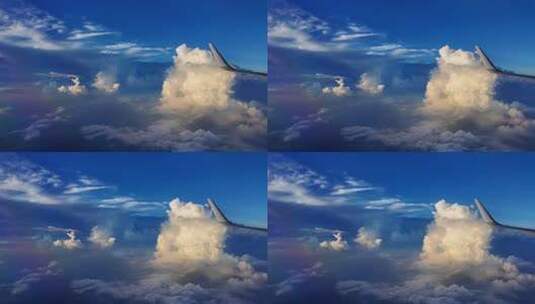 飞机舷窗看蓝天下的云朵变幻高清在线视频素材下载