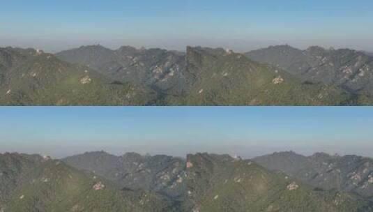 航拍4K晨曦中的千山山脉高清在线视频素材下载