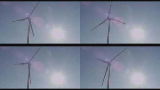 阳光照耀 风力发电机高清在线视频素材下载
