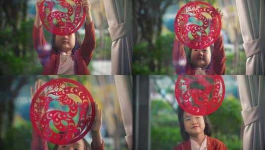 蛇年春节中国娃娃贴窗花剪纸4K高清在线视频素材下载