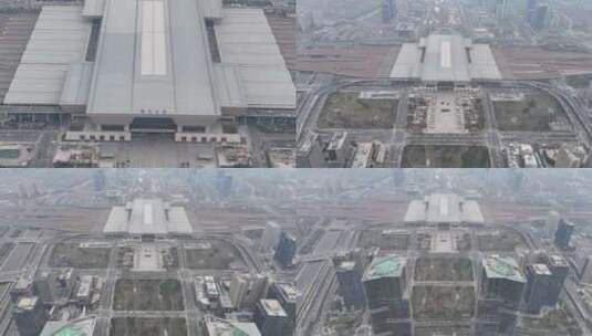 郑州东站变焦城市车流高楼大厦双子塔后飞高清在线视频素材下载